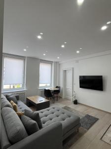 TV a/nebo společenská místnost v ubytování AppartHôtel Elite Spa