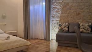 Posedenie v ubytovaní Medulić Palace Rooms & Apartments