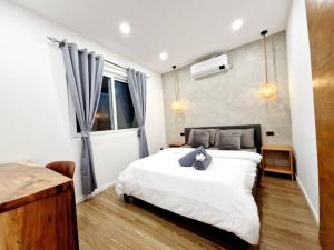 Ένα ή περισσότερα κρεβάτια σε δωμάτιο στο TimeOut Apartment