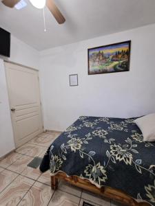 Postel nebo postele na pokoji v ubytování Hotel Las Palomitas