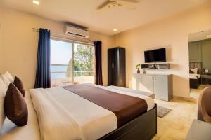 TV a/nebo společenská místnost v ubytování Harmony Palace