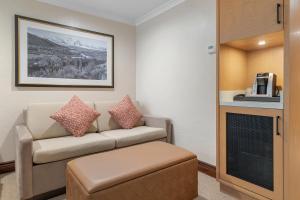 a living room with a couch and a coffee table at The Lodge at Jackson Hole in Jackson
