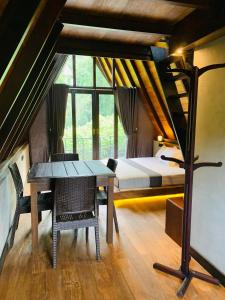 Posezení v ubytování Cannelle Hill Cabanas