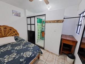 Postel nebo postele na pokoji v ubytování Hotel Las Palomitas