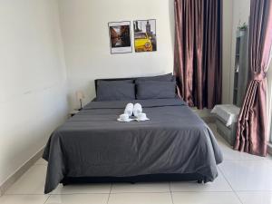 Postel nebo postele na pokoji v ubytování Da Men Studio Service Apartment + 21 fotografií