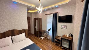 TV a/nebo společenská místnost v ubytování La Vien Hotel Old City