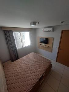Postel nebo postele na pokoji v ubytování Apartamento 704-C Casa da Madeira Caldas Novas