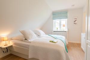 Postel nebo postele na pokoji v ubytování Mimis Hues