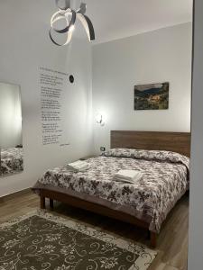 Postel nebo postele na pokoji v ubytování B&B Paola City