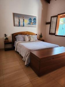 Postel nebo postele na pokoji v ubytování Posada Recanto Minguero