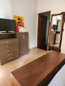 TV a/nebo společenská místnost v ubytování Posada Recanto Minguero + 7 fotografií