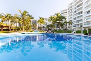 Bazén v ubytování DEPARTAMENTO FRENTE A PLAYA EN NUEVO VALLARTA nebo v jeho okolí