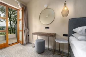 Postel nebo postele na pokoji v ubytování Boutique Hotel Paradiso
