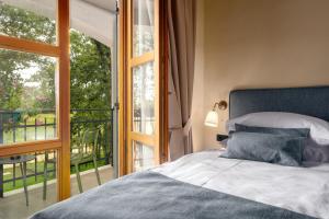 Postel nebo postele na pokoji v ubytování Boutique Hotel Paradiso