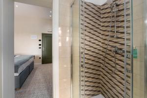 Postel nebo postele na pokoji v ubytování Boutique Hotel Paradiso