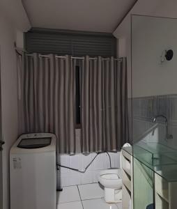 Uma casa de banho em Apartamento com ar-condicionado