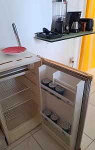 A cozinha ou kitchenette de Apartamento com ar-condicionado