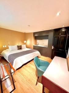 Postel nebo postele na pokoji v ubytování Hotel Regina
