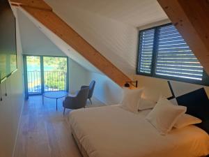 Postel nebo postele na pokoji v ubytování Beau Rivage