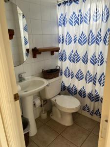 Vannas istaba naktsmītnē Horcon Condominio CAUCAU