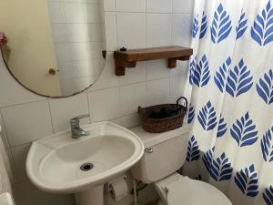 Vannas istaba naktsmītnē Horcon Condominio CAUCAU