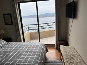 Gulta vai gultas numurā naktsmītnē Horcon Condominio CAUCAU