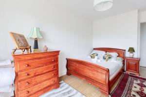 En eller flere senge i et værelse på Appartement 2 pièces à Creteil