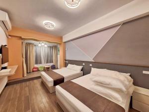 Postel nebo postele na pokoji v ubytování Happy Villa Sea View B&B