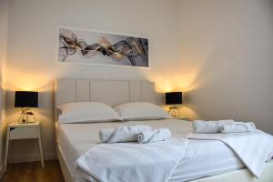 Postel nebo postele na pokoji v ubytování Villa Luna&Aurora