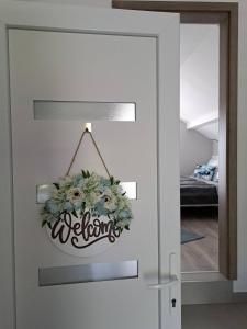 Postel nebo postele na pokoji v ubytování Family Apartment Sátoraljaújhely