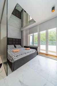 Postel nebo postele na pokoji v ubytování Zebrano Spa