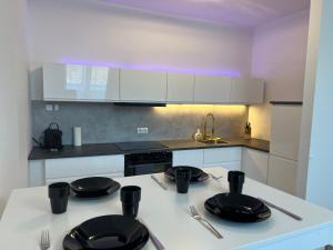 Köök või kööginurk majutusasutuses "Home-Suite-Home" im historischen Zentrum von Hartberg