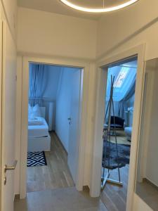 Voodi või voodid majutusasutuse "Home-Suite-Home" im historischen Zentrum von Hartberg toas