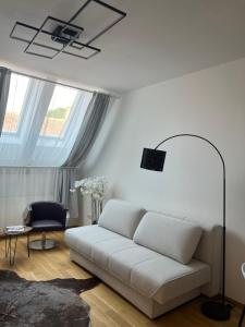Istumisnurk majutusasutuses "Home-Suite-Home" im historischen Zentrum von Hartberg
