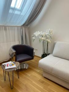 Istumisnurk majutusasutuses "Home-Suite-Home" im historischen Zentrum von Hartberg