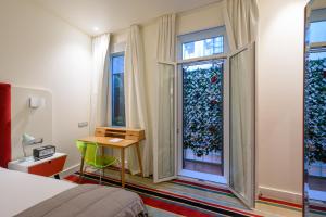Giường trong phòng chung tại Hotel DeBrett