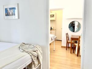 A bed or beds in a room at Little Troll House 1