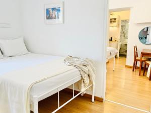 A bed or beds in a room at Little Troll House 1