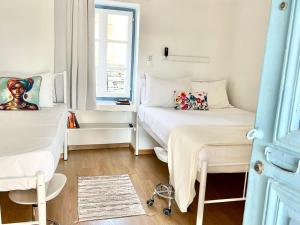 A bed or beds in a room at Little Troll House 1