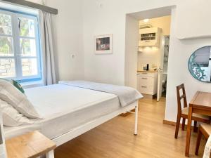 A bed or beds in a room at Little Troll House 1