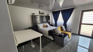 Postel nebo postele na pokoji v ubytování Ticia Apartment, Chipata