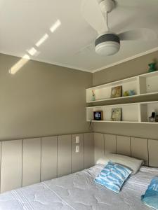 Postel nebo postele na pokoji v ubytování Casa condomínio Las Olas Imbé + 36 fotografií