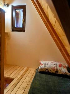 Postel nebo postele na pokoji v ubytování Konaci Gradina 3