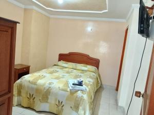 Hotel El Dorado Guatavita客房内的一张或多张床位