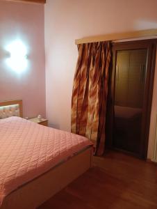 Postel nebo postele na pokoji v ubytování City View ROOM