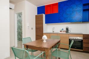 Η κουζίνα ή μικρή κουζίνα στο LE DIMORE DI Grè Suites con parcheggio privato