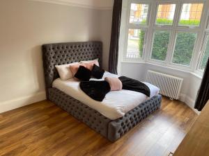 Voodi või voodid majutusasutuse Easystays The Hidden Mansion Sleeps 15 toas