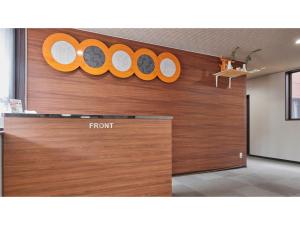 una porta d'ingresso di un Apple Store con la scritta "front" di AMA TERRACE - Vacation STAY 31138v ad Amami