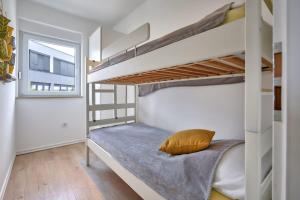 Postel nebo postele na pokoji v ubytování Lori