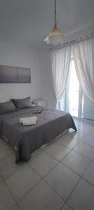 Ένα ή περισσότερα κρεβάτια σε δωμάτιο στο White Beach Appartment